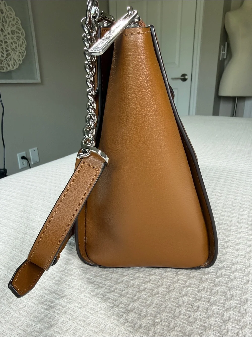Michael Kors saddle tan saffiano leather satchel with silver hardware